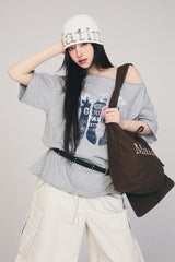 MATIN KIM MTK 16 GRAFFITI LOGO ASYMMETRIC TOP IN GREY