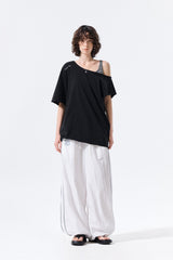 MATIN KIM ASYMMETRIC OFF SHOULDER TOP IN BLACK