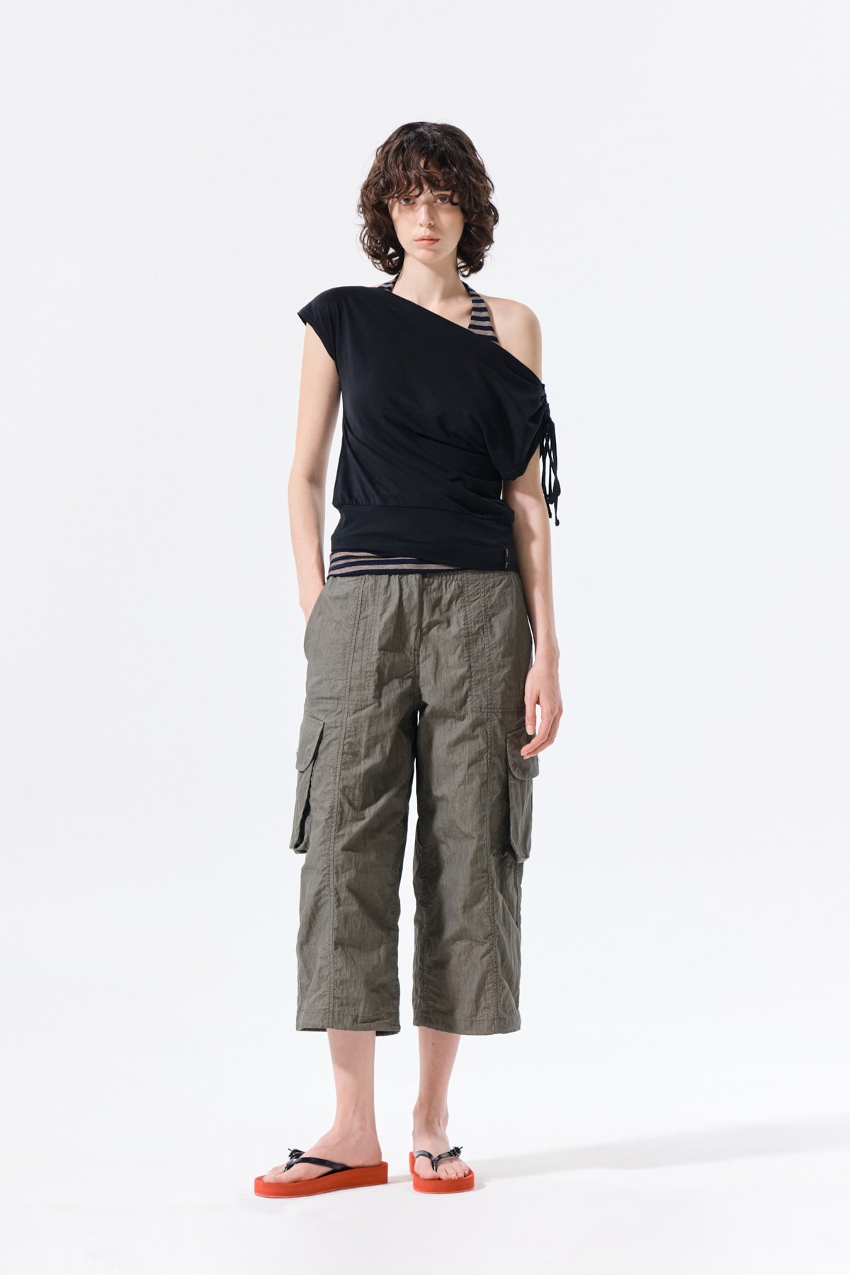 MATIN KIM DRAPED ASYMMETRIC SLEEVELESS TOP IN BLACK